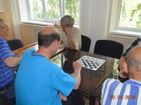 Кружковое занятие по игре в шашки