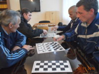 Кружковое занятие по игре в шашки